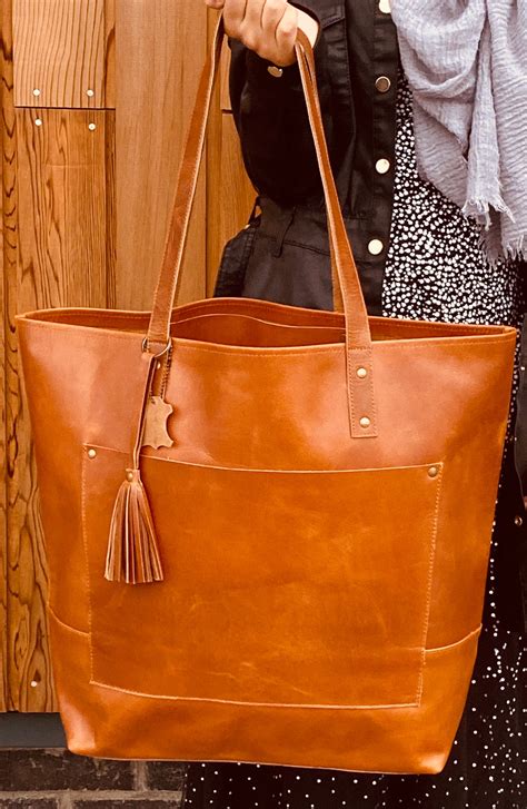 large leather tote with pockets